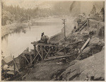 Concrete plant of subcontractor in distance and plant of Power Company in foreground. Oct. 9, 1913