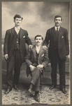 [Studio portrait of three unidentified young men]