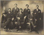 [Studio portrait of six unidentified men]