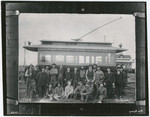 [Men posing in front of Sacramento streetcar]