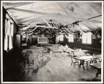 [Unidentified interior. Makeshift church?]