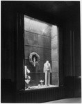 [Exterior night shot display window Bullock's Wilshire building.]