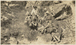 At a little geyser on hillside near our first camp on Nez Perce Creek. Gretchen, Dorothy H., George, Rusty, Neill, Marie, Helen and Mary. It spurted a foot high - and we thought it was a wonder! (Our first geyser)