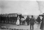 [Victim being placed in Red Cross wagon. Unidentified location]