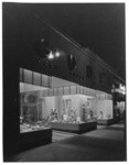 [Exterior front display windows and entrance of Gude's shoe store] (2 views)