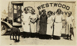 [Women posed by Westwood Laundry truck, Westwood]