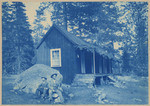 [Two men by cabin at Deer Park Inn, Placer Co.]