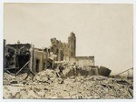 [Two men standing in ruins of the Los Angeles Times building]