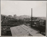 [View to northeast from near Rincon Hill toward Telegraph Hill (center). Russian Hill, far left; Merchants' Exchange Building, left center]