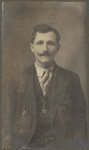 [Studio portrait of young man]