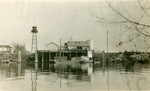 Celery barge loading fuel & lubricants at Walnut Grove Sub Station on Sacramento River, Dec 1921