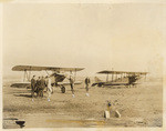 [Biplanes on airfield]