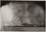 [View of city burning from San Francisco Bay. Telegraph Hill, center]