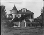 [House with water tower] (2 views)