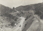 Here is a picture taken three years ago showing the grading work for the first San Fernando Valley electric line through the Cahunega Pass