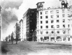 [View east on Market St. from near Third St. during fire. Palace Hotel burning, left center; Hearst Building, right]