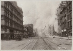 [Market St. looking north from ca. Seventh St. during fire. Flood Building and Call Building in distance, center]