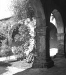 [Corridor and garden at Mission San Juan Capistrano]