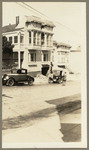 [House in San Francisco, front view with cars parked in front]