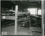 [Belts and lumber planks inside Setzer Box Co. building, 2570-2610 3rd Street, Sacramento]