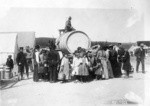 [Refugees gathered at water wagon. Unidentified refugee camp]