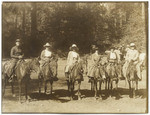 [Group picture of mounted riders]