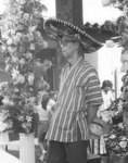 [Japanese tourist in sombrero]