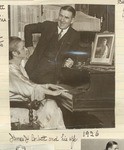 [James J. Corbett and his wife at the piano]