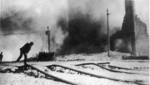 [Street scene during fire. Streetcar rails buckled from earthquake]