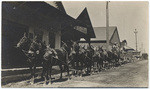 [Horse team and loaded wagons in Lincoln]