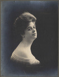 [Shoulder length studio portrait of unidentified woman]