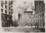 [Winchester House burning on Third St. at Stevenson, south of Market St. Hearst Building, left; base of Call Building, right]