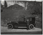 [Chauffeur with automobile]