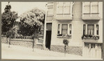 [Front of San Francisco house with sloping sidewalk]