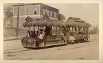 [View of decorated street-cars]