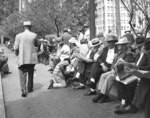 [Men on benches in Pershing Square]