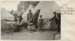 Fire refugees cooking breakfast.