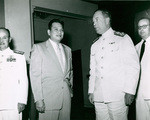 [President Ramon Magsaysay, Admiral Radford, former U.S. Minister Charles Burrows]