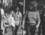 [Women crossing street]