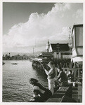 [Family fishing from a pier in Santa Barbara]