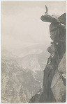 [Man doing handstand on Overhanging Rock at Glacier Point]