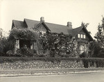 House covered with wisteria on Arroyo Drive