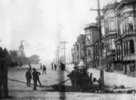 [Fire engine at hydrant. Van Ness looking north from probably McAllister]