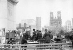 [Makeshift refugee relief effort in Union Square. Dewey Monument, left; Fairmont Hotel atop Nob Hill, left center; Temple Emanu-el, right center]