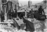 [Men searching contents of safes. Sutter St. near Kearney]