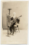 [C.W.J. Johnson with his one man band invention]