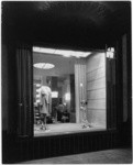 [Exterior night shot front display window Bullock's Wilshire building.]