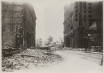 [Razing of building? Market St. looking southwest from near Fourth St. Emporium department store, left; Flood Building, right]