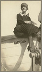 [Woman posing on ship, Admiral Dewey?]