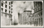 [Winchester House burning on Third St. at Stevenson, south of Market St. Hearst Building, left; base of Call Building, right]